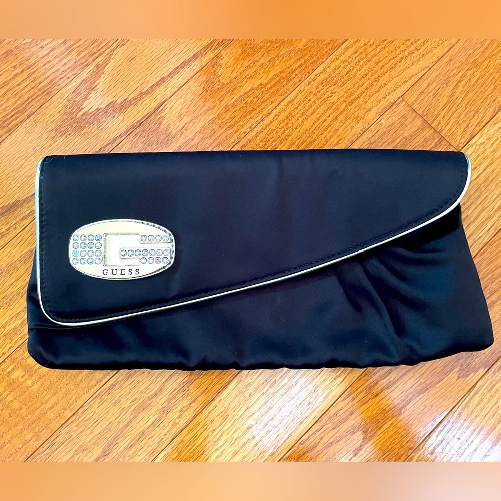 Black Guess clutch evening bag with gold detail